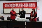 武陵区纪委监委开展“绿色书签”志愿服务活动　　　　　　　——送健康书籍给社木铺小学